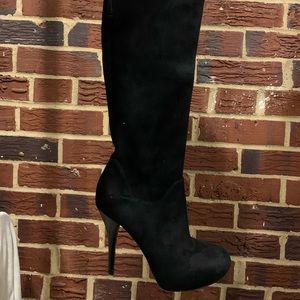 Black suede below the knee heeled boots